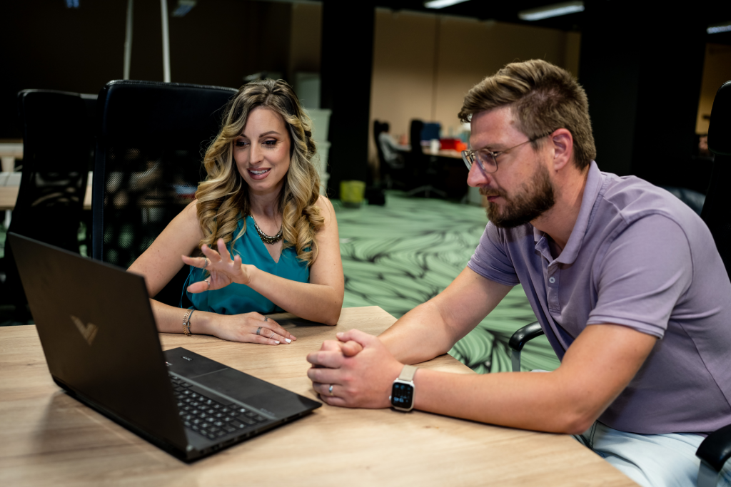 Maryanna Franco and client looking at Technical seo proposals